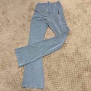 Free People Movement. Never worn.  Light grey flared legging.